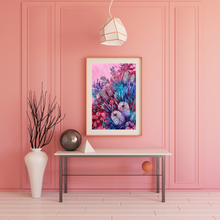 Load image into Gallery viewer, Decorative interior with a pink wall, table, and colorful artwork.