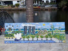 Load image into Gallery viewer, Mosaic artwork of the Singapore skyline with buildings and greenery, placed in a garden
