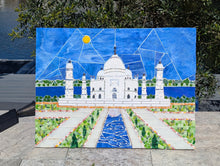 Load image into Gallery viewer, Painting of the Taj Mahal with geometric patterns and a blue sky, placed in a garden

