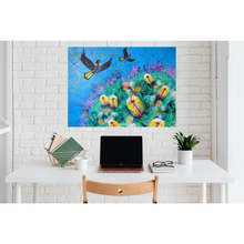 Load image into Gallery viewer, Colourful artwork of yellow-tailed black cockatoos and Australian bush flowers on a blue background
